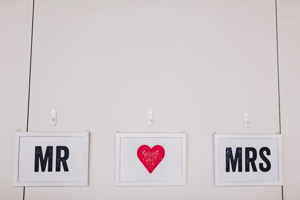 two Mr and Mrs wall decors