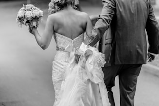 grayscale photography of wedding couple