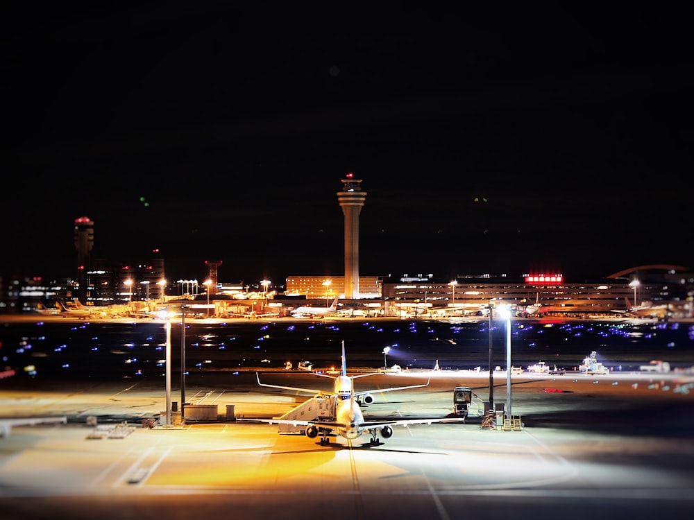 a large jetliner sitting on top of an airport tarmac