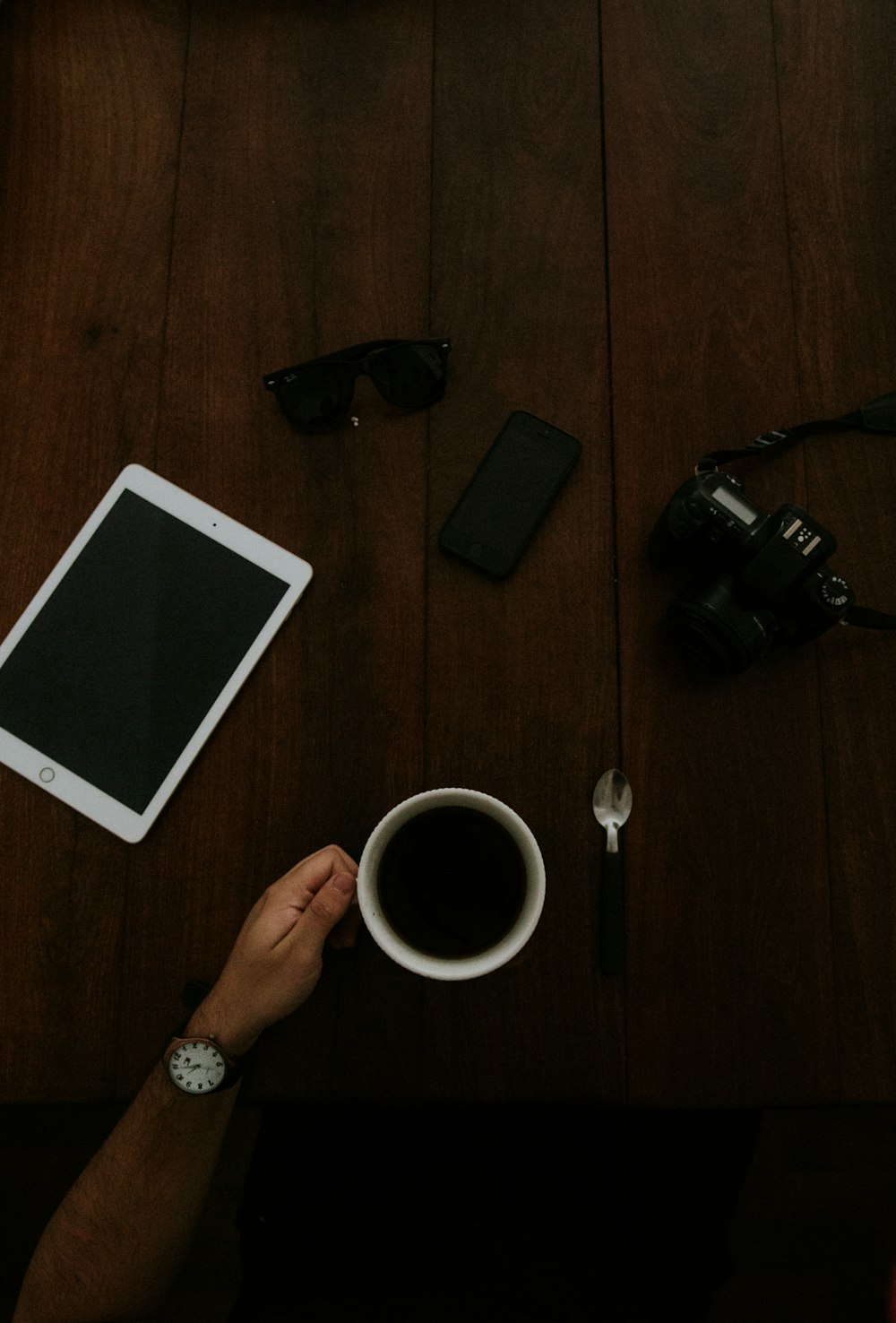 white ceramic mug and white iPad