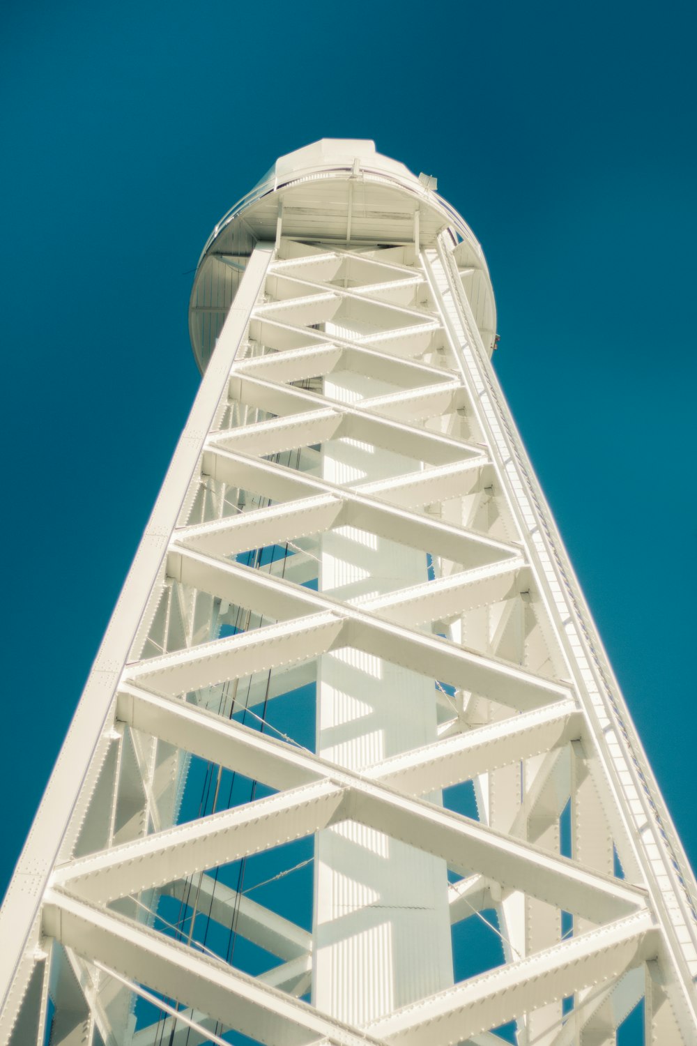 white metal frame under blue sky during daytime