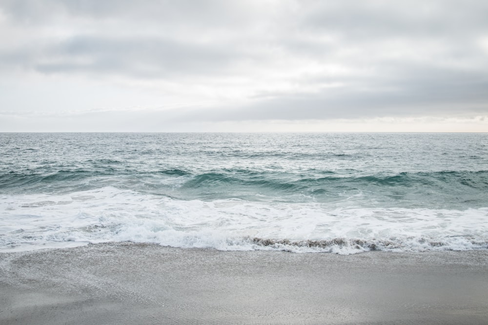 time-lapse photography of ocean waves