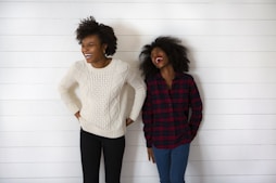 two woman smiling