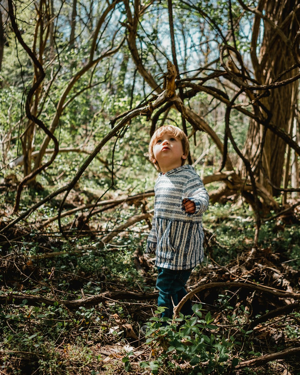 shallow focus photography of boy