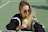 woman holding tennis ball