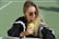 woman holding tennis ball