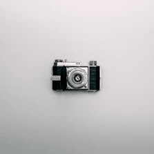 silver and black Kodak DSLR camera
