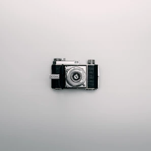 silver and black Kodak DSLR camera