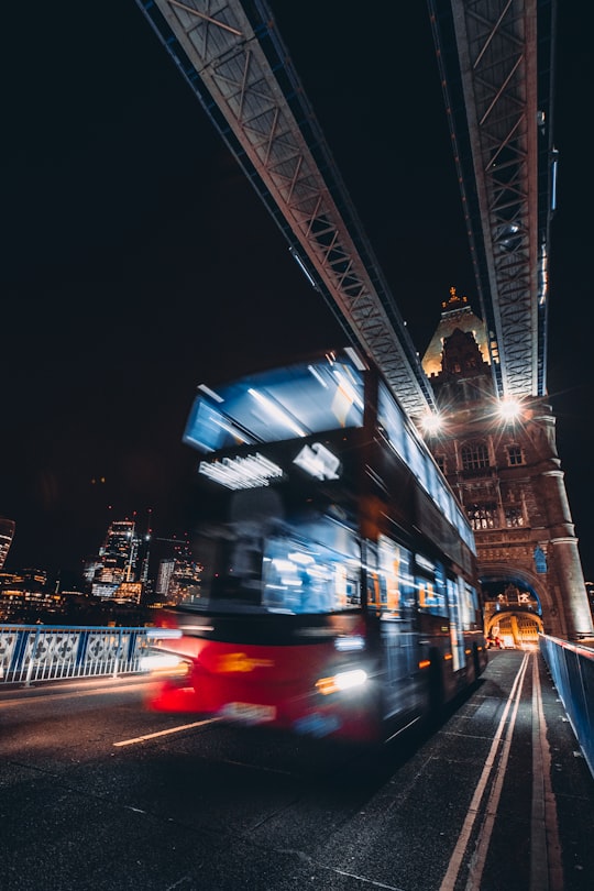 time-lapse photography of bus in the city in Tower Bridge United Kingdom