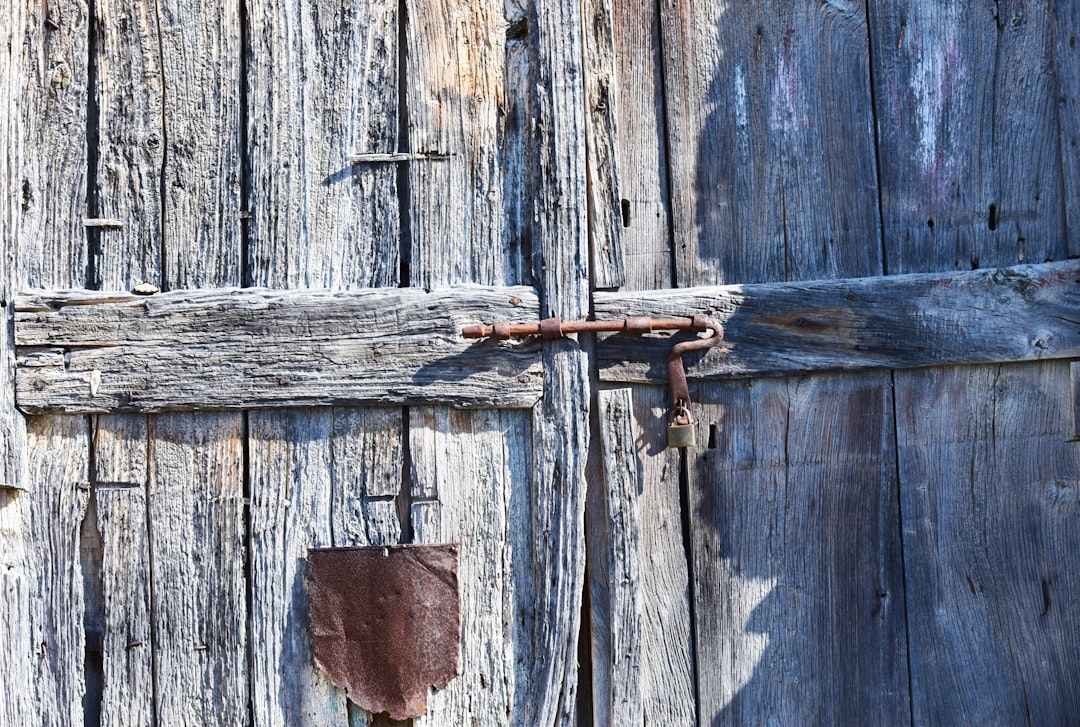 brown wooden door with brown metal door handle