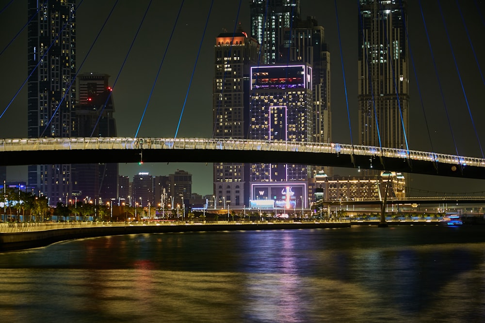 black suspension bridge during night time