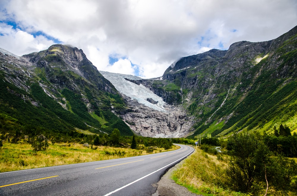 photo of concrete pavement heading mountain