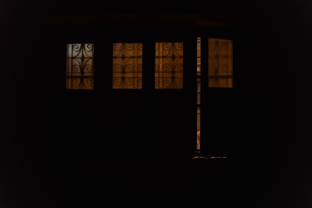 silhouette photo of opened door