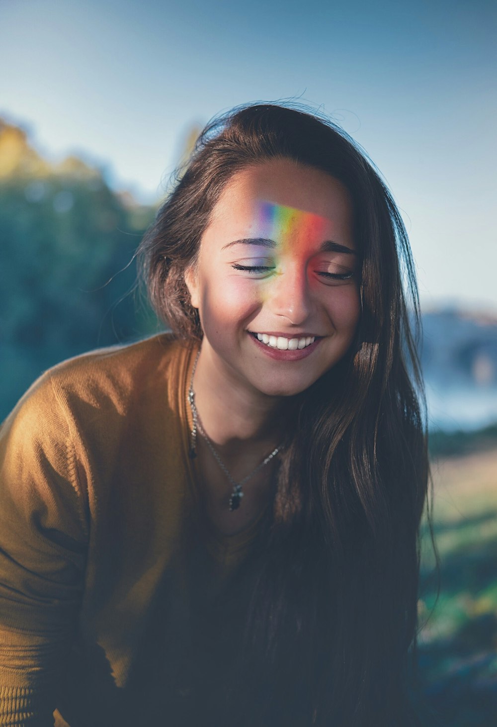 shallow focus photography of smiling woman