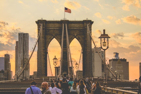 people walking on Brooklyn Bridge in Brooklyn Bridge United States
