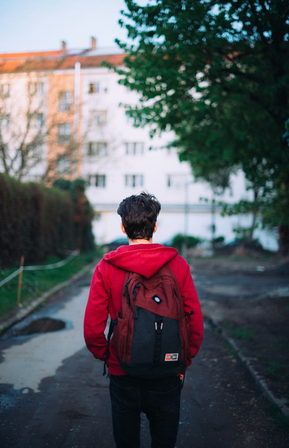 shallow focus photography of walking man