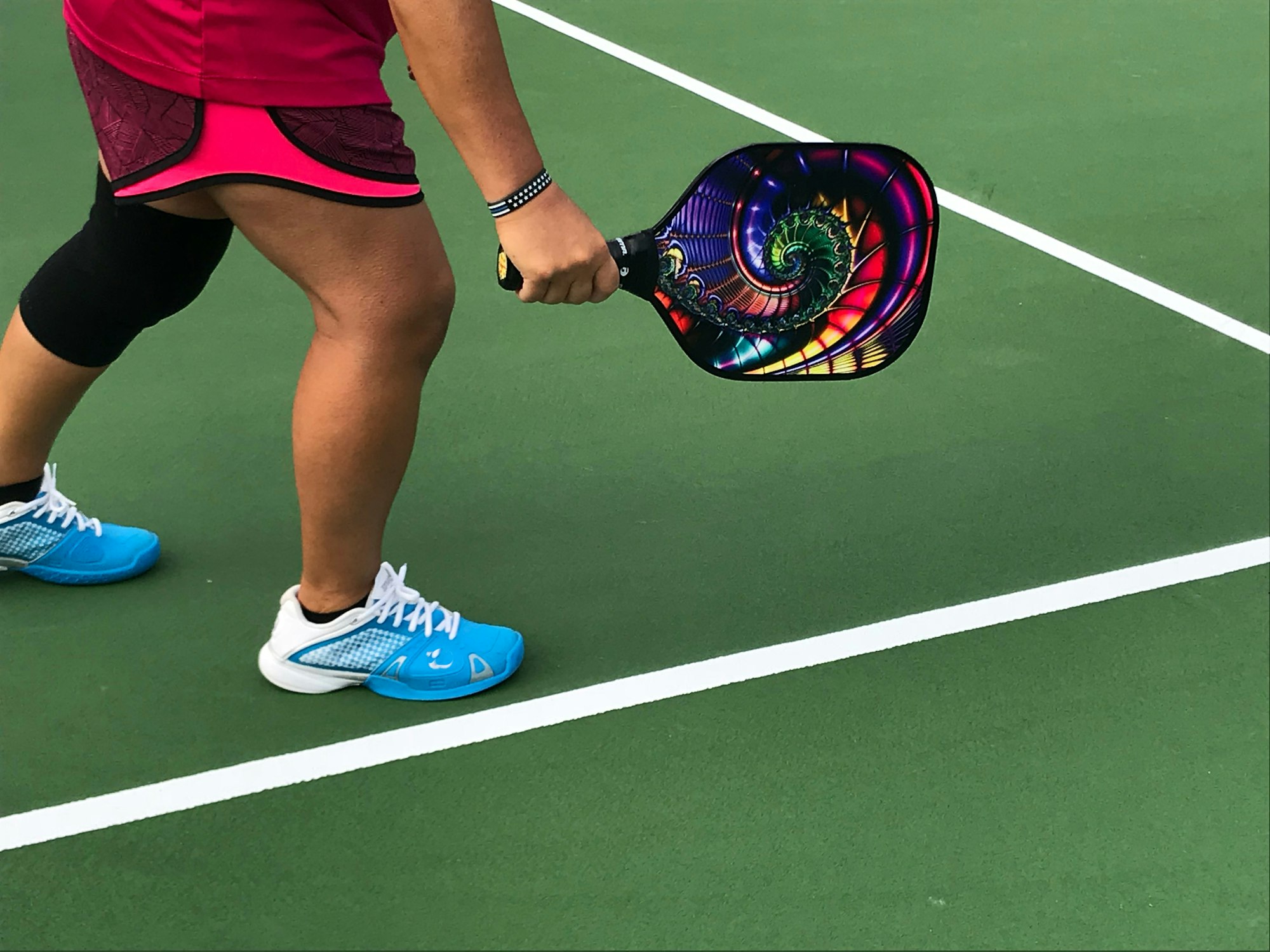 pickleball player playing pickleball with pickleball equipment