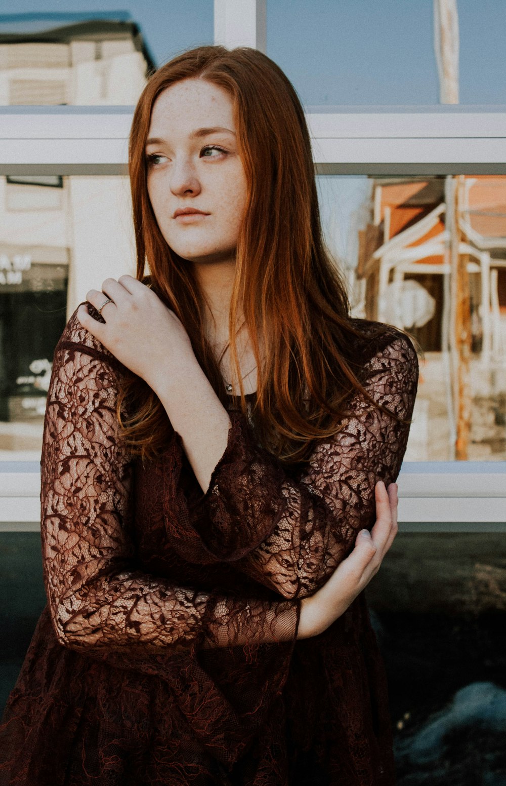 woman wearing black long-sleeved dress