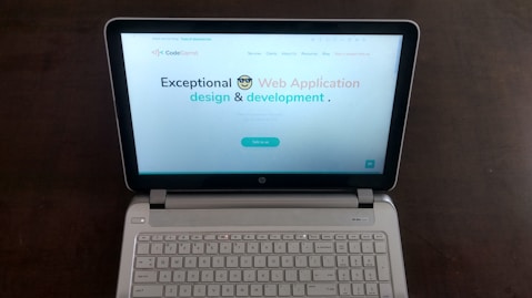 A sleek, modern website displayed on a laptop screen.