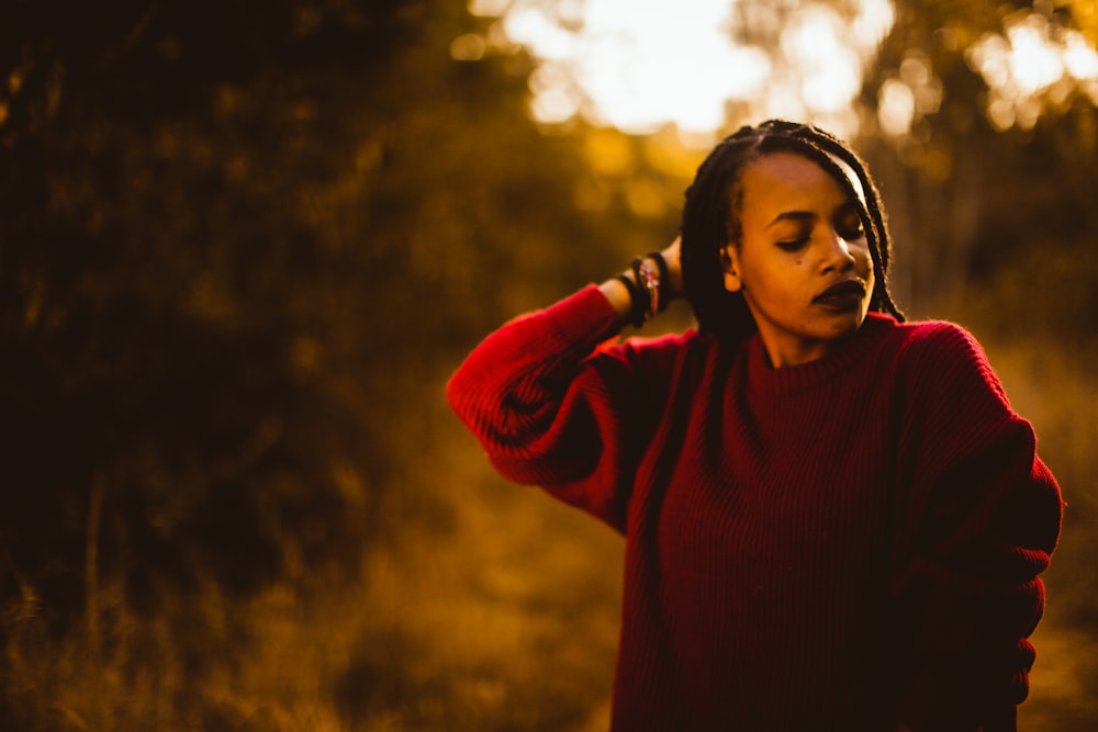 woman wearing red sweatshirt