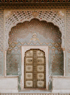 brown ornate wooden door