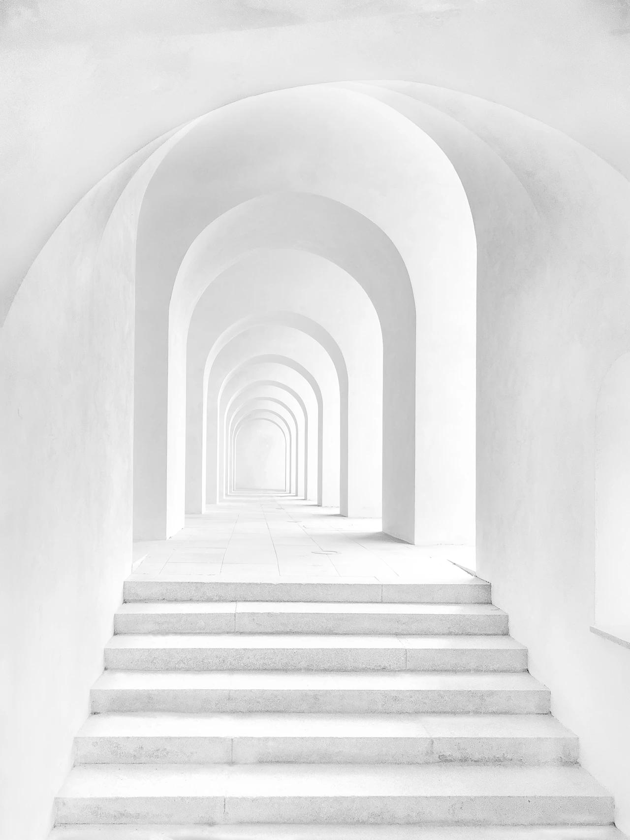Minimalist white arched architecture