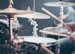 person playing drums