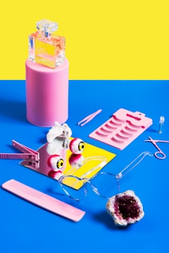 A vibrant flat lay of edgy Y2K-inspired accessories with bold colors and playful shapes.