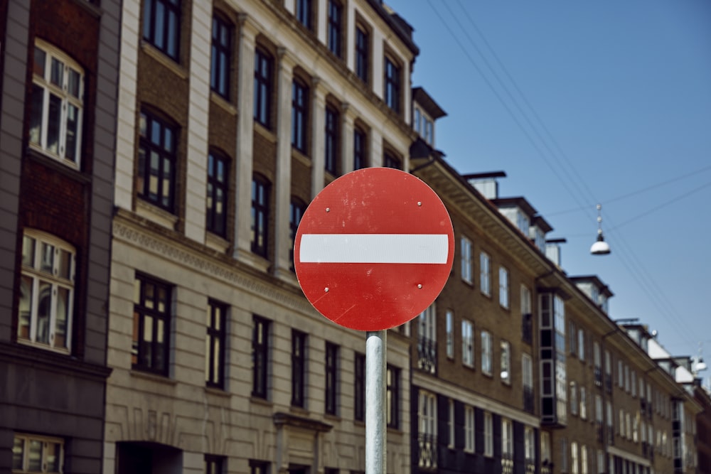 white and red road signage