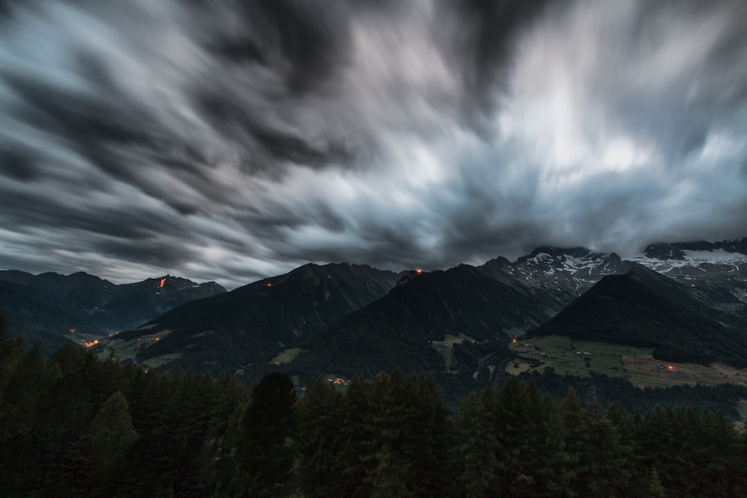 black mountain under nimbus clouds