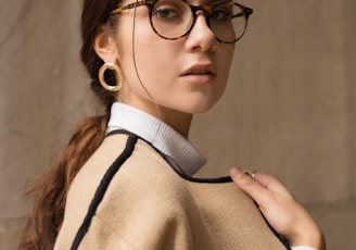 woman wearing brown and black coat