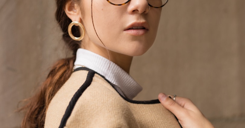 woman wearing brown and black coat