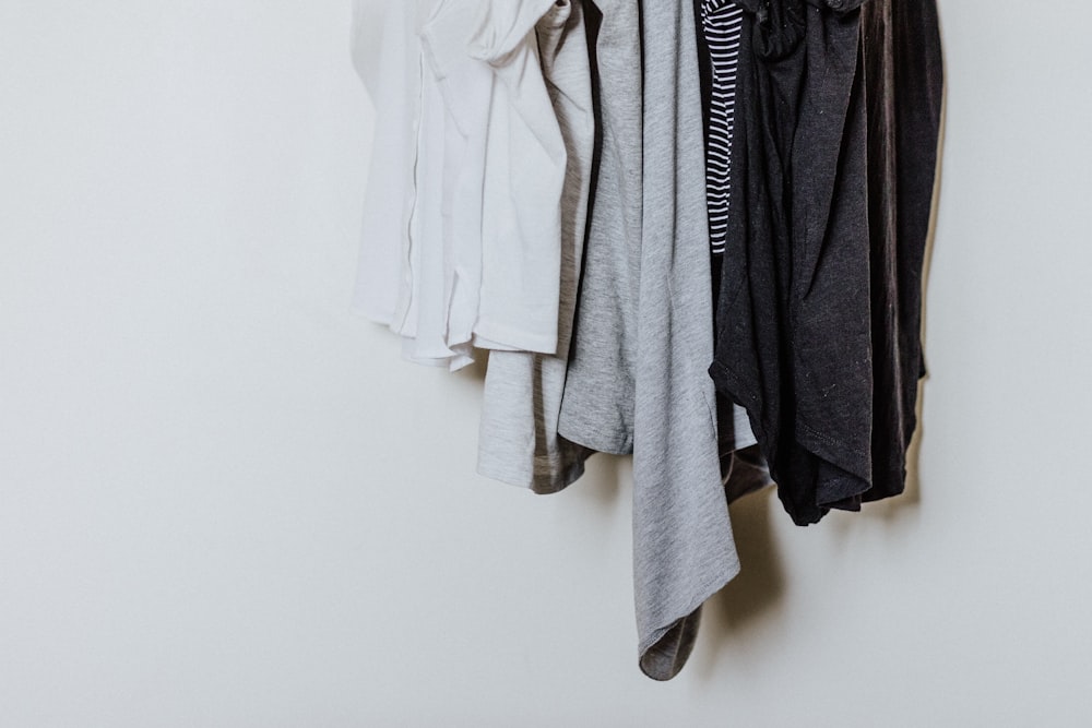 hanged shirts against white background