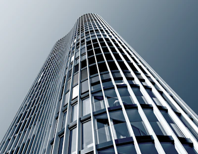 low-angle photography of curtain wall building
