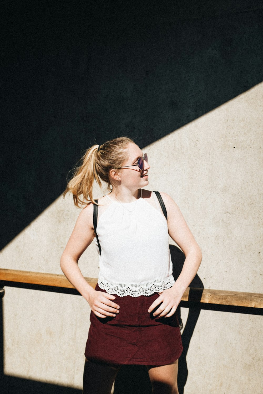 woman standing in front of wall