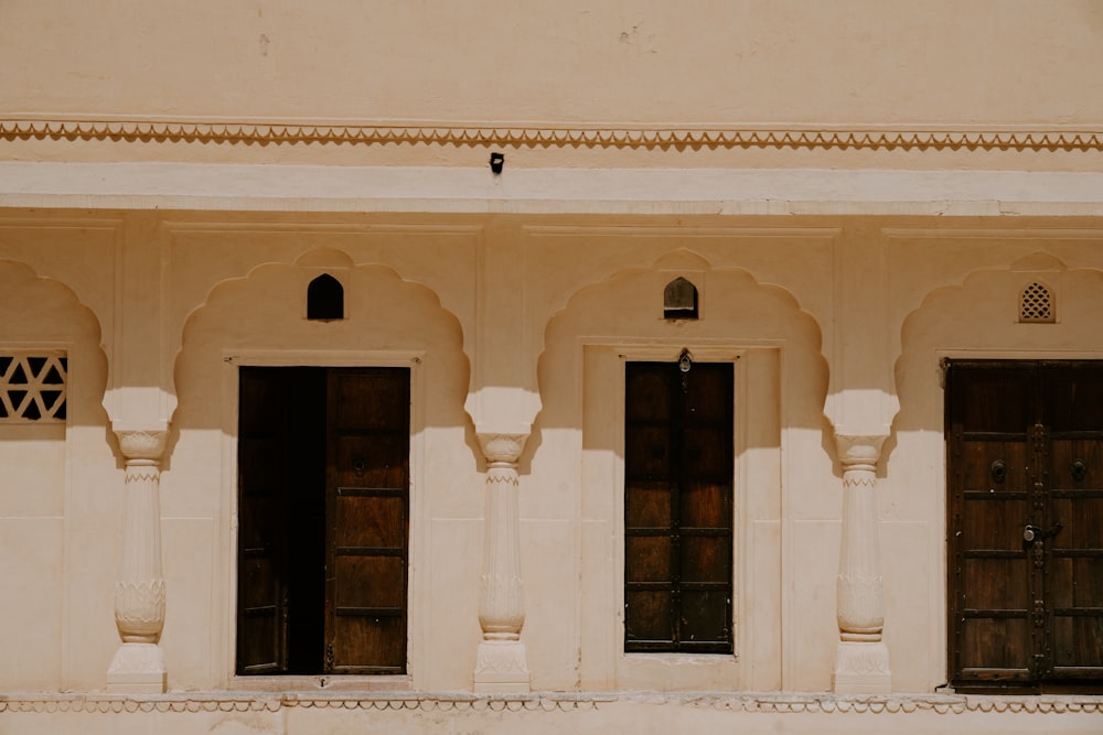 three wooden door close