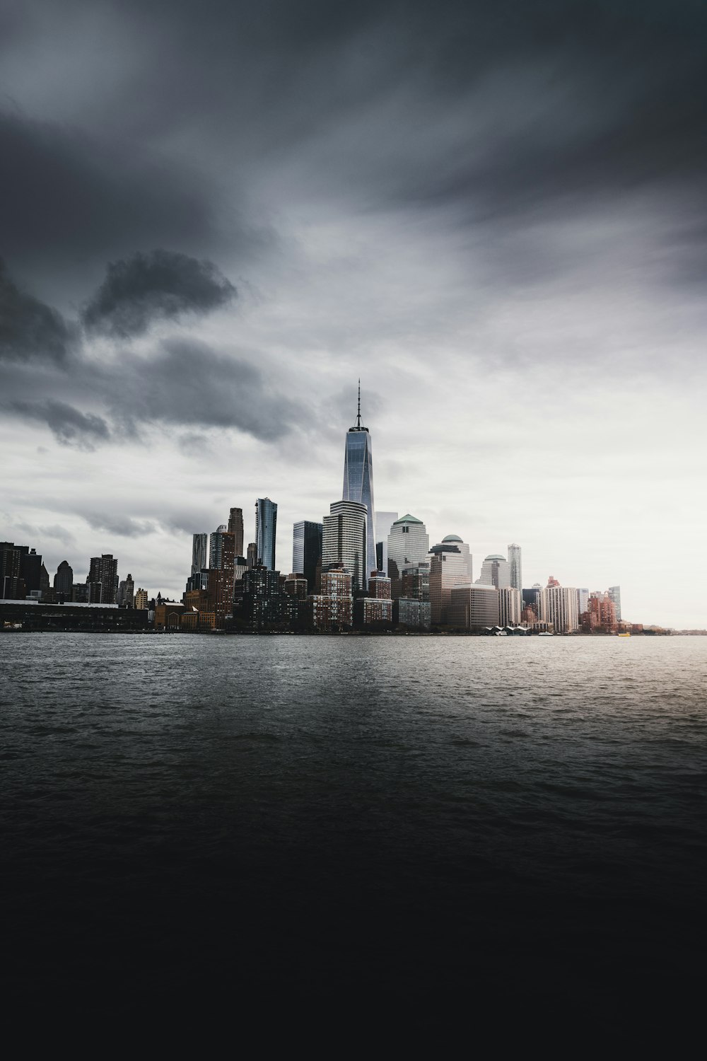 city scape view near body of water at daytime