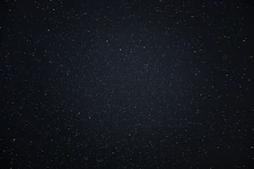 a night sky with a few stars in it