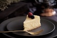 sliced of cake on black plate