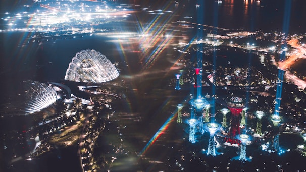 Futuristic 3D cityscape with interactive buildings and glowing effects.