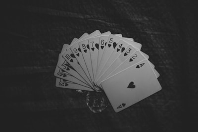 Multiple collectible cards arranged in a fan shape highlighting their condition.