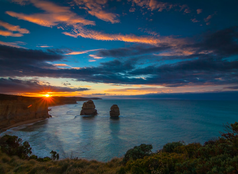 blue ocean water during sunset