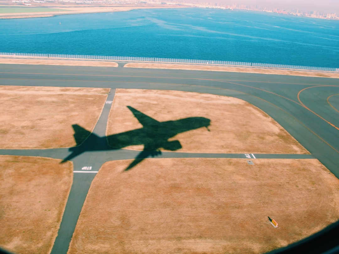 aerial photography of silhouette airplane,