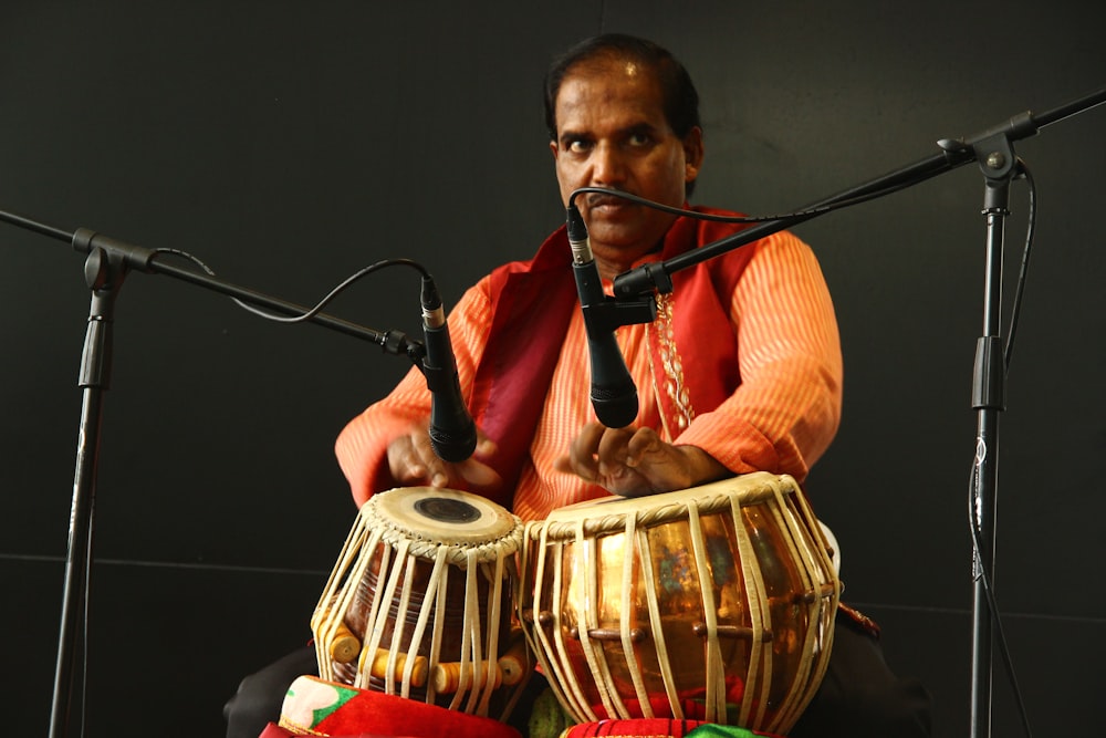 man playing a drum instrument