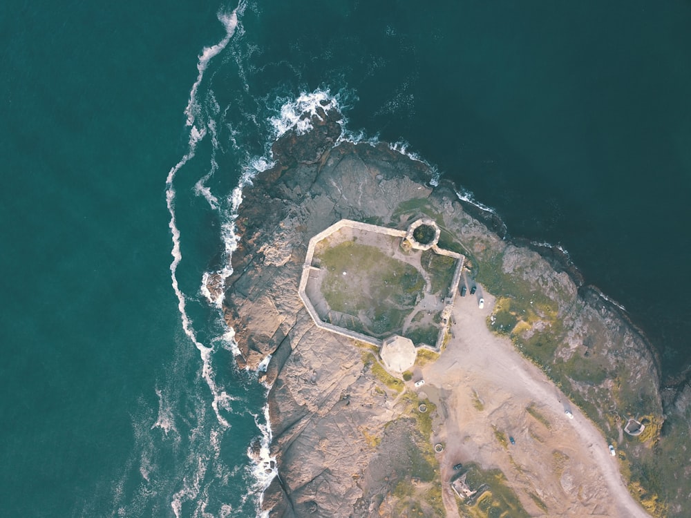 aerial view photography of island beside sea at daytime