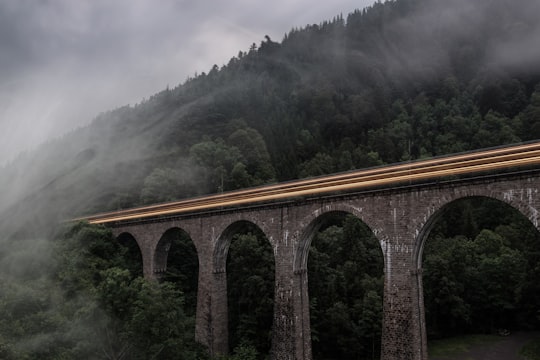 gray concrete bridge during daytime in Black Forest Germany