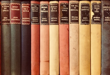 closeup photo of assorted-title books