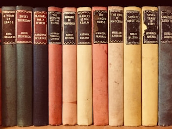 closeup photo of assorted-title books