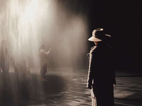 An artistic photo with dramatic lighting during a wedding ceremony.
