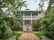 white house with outdoor fountain